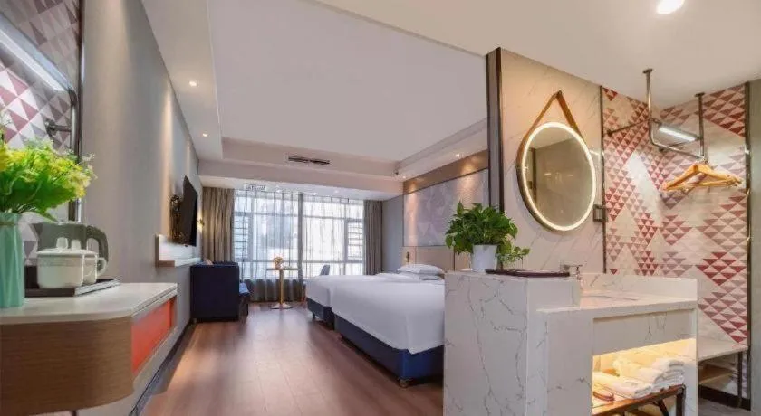 Bed in Borrman Hotel Liuzhou High-Speed Railway Station