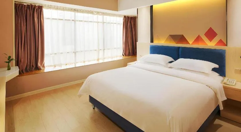 Bed in Borrman Hotel Liuzhou High-Speed Railway Station