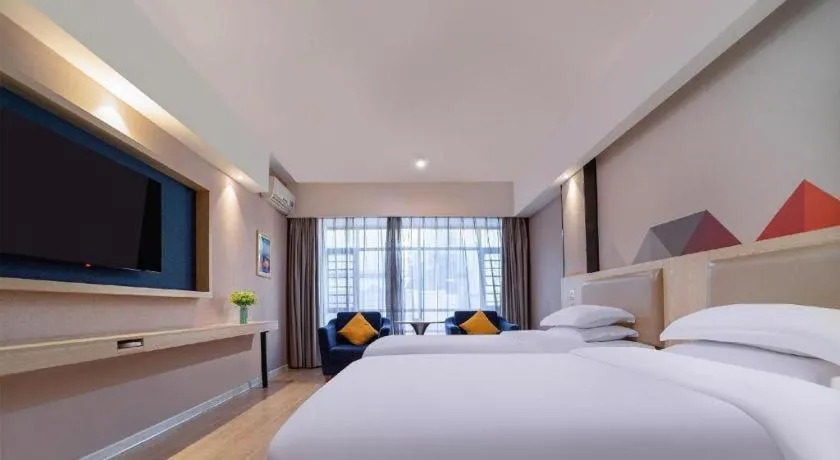Bed in Borrman Hotel Liuzhou High-Speed Railway Station