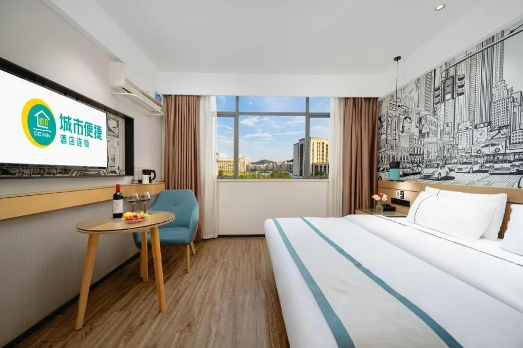 Bed in City Comfort Inn Shaoguan Biguiyuan Phoenix City Gold Village