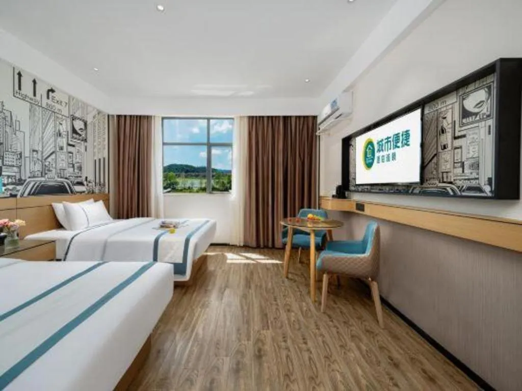 Bed in City Comfort Inn Shaoguan Biguiyuan Phoenix City Gold Village