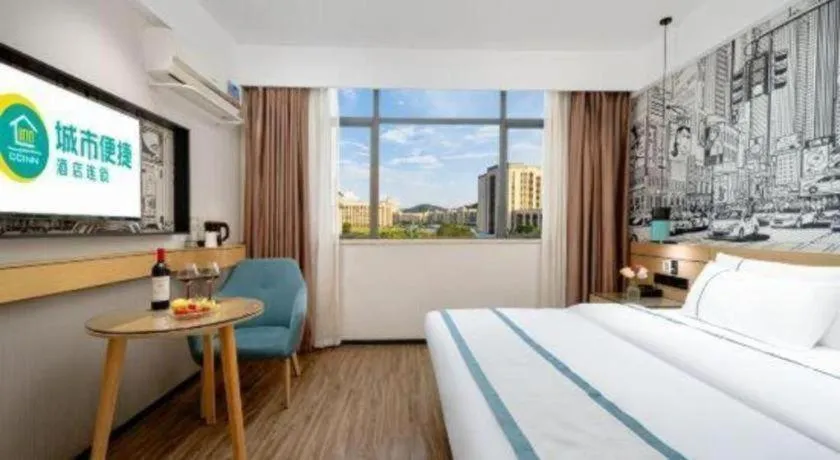 Bed in City Comfort Inn Shaoguan Biguiyuan Phoenix City Gold Village