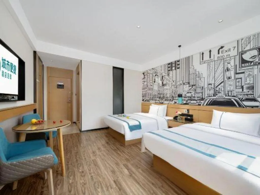 Bed in City Comfort Inn Shaoguan Biguiyuan Phoenix City Gold Village