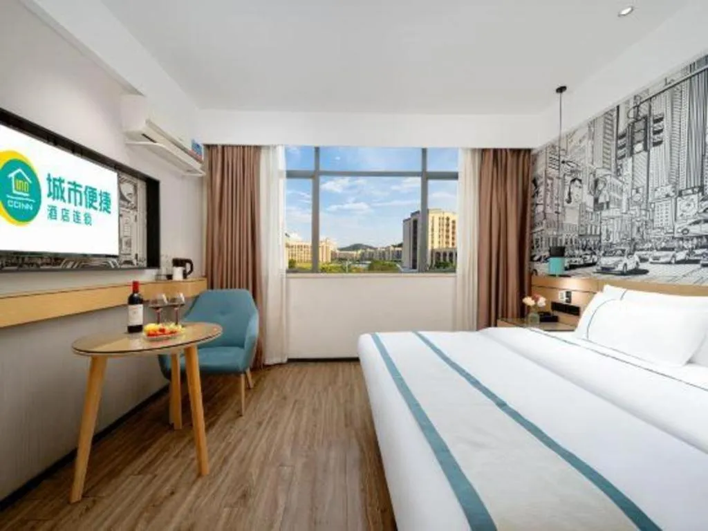 Bed in City Comfort Inn Shaoguan Biguiyuan Phoenix City Gold Village