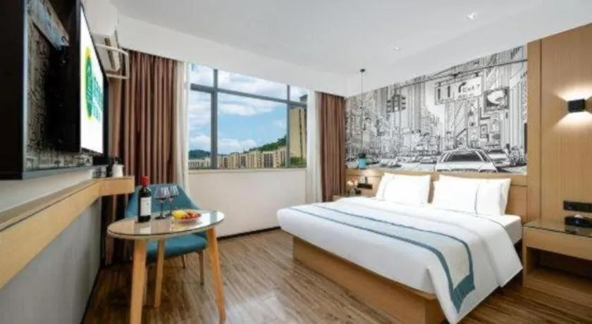 Bed in City Comfort Inn Shaoguan Biguiyuan Phoenix City Gold Village