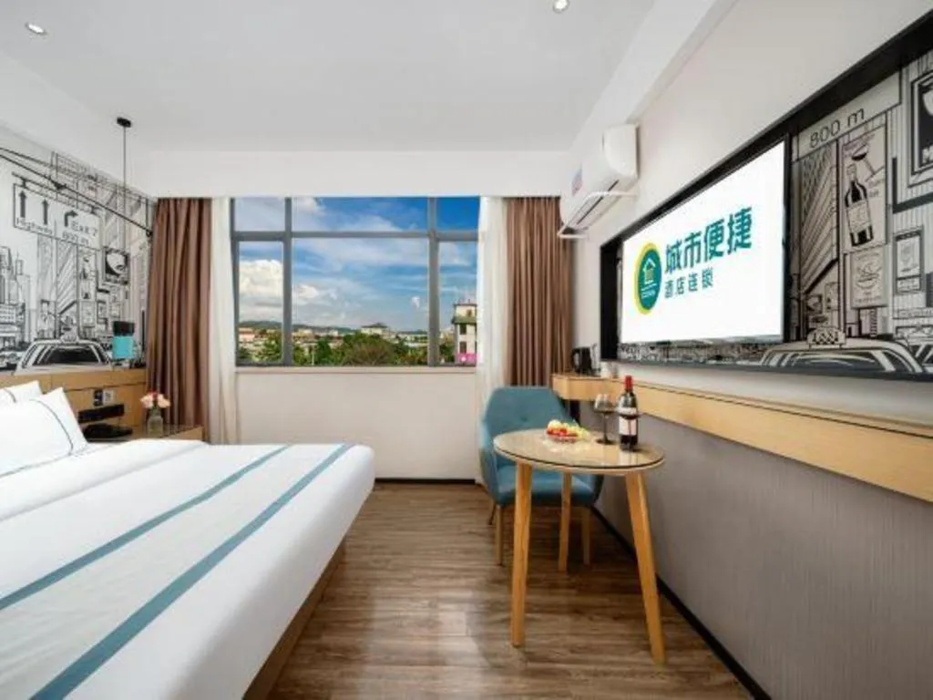 Bed in City Comfort Inn Shaoguan Biguiyuan Phoenix City Gold Village