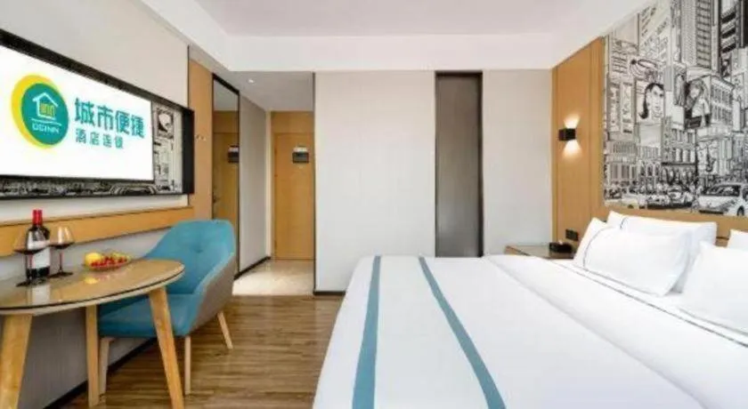 Bed in City Comfort Inn Shaoguan Biguiyuan Phoenix City Gold Village