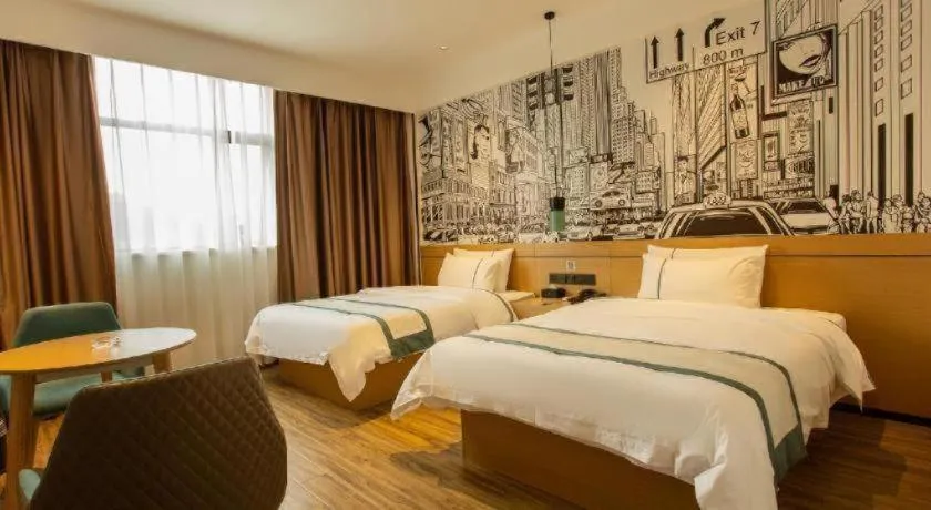 Bed in City Comfort Inn Shaoguan Biguiyuan Phoenix City Gold Village