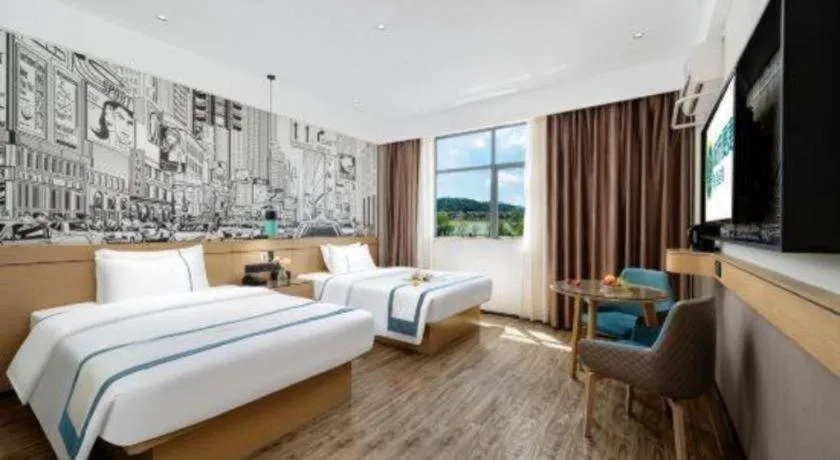 Bed in City Comfort Inn Shaoguan Biguiyuan Phoenix City Gold Village