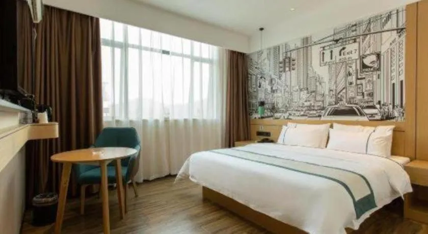 Bed in City Comfort Inn Shaoguan Biguiyuan Phoenix City Gold Village