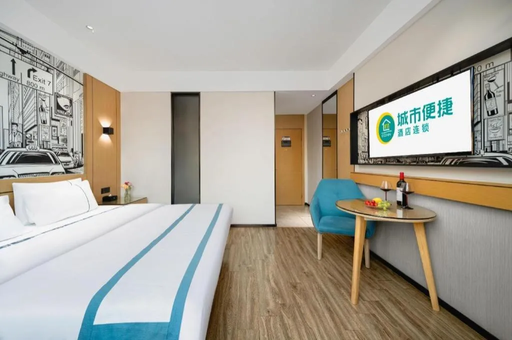 Bed in City Comfort Inn Shaoguan Biguiyuan Phoenix City Gold Village