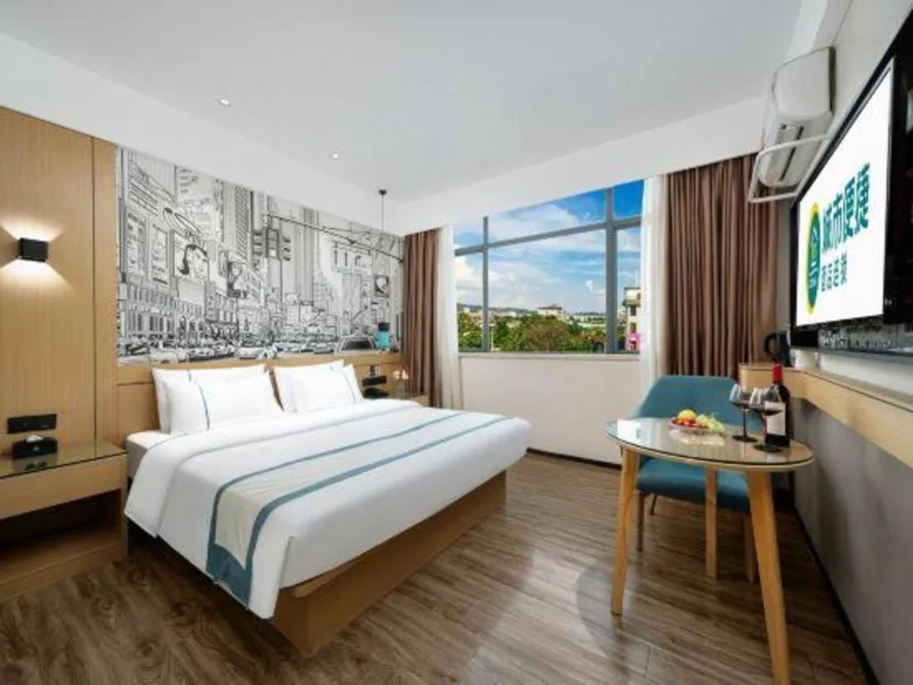 Bed in City Comfort Inn Shaoguan Biguiyuan Phoenix City Gold Village