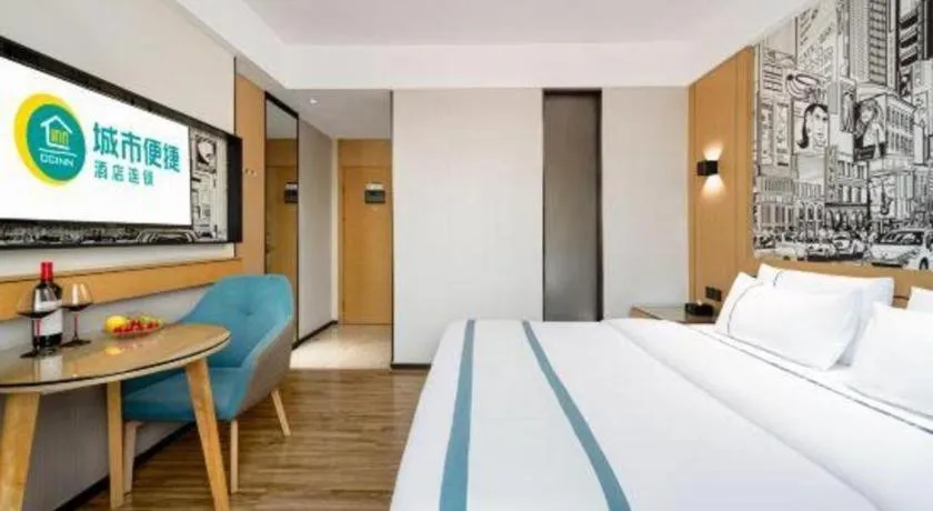 Bed in City Comfort Inn Shaoguan Biguiyuan Phoenix City Gold Village