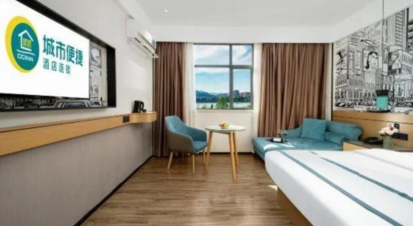 Bed in City Comfort Inn Shaoguan Biguiyuan Phoenix City Gold Village