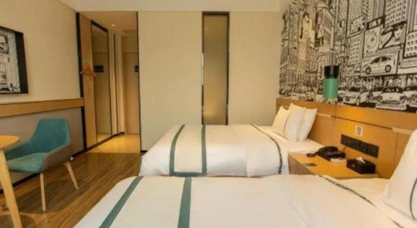 Bed in City Comfort Inn Shaoguan Biguiyuan Phoenix City Gold Village