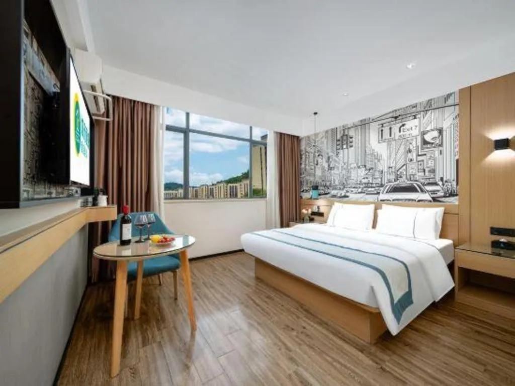 Bed in City Comfort Inn Shaoguan Biguiyuan Phoenix City Gold Village