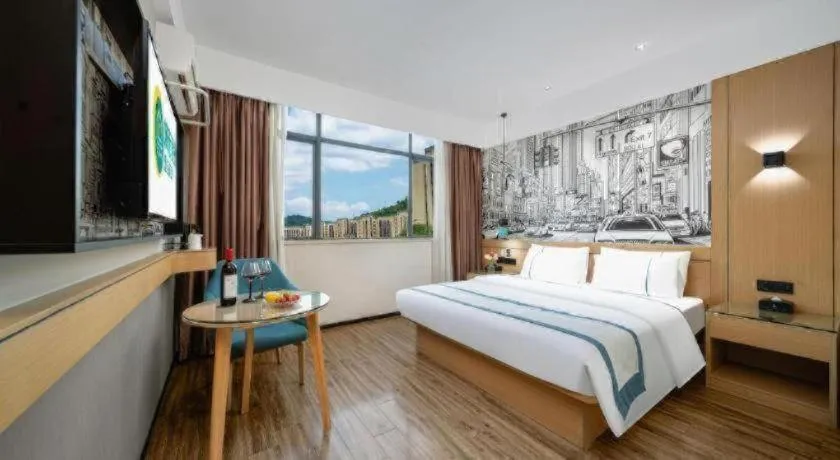 Bed in City Comfort Inn Shaoguan Biguiyuan Phoenix City Gold Village