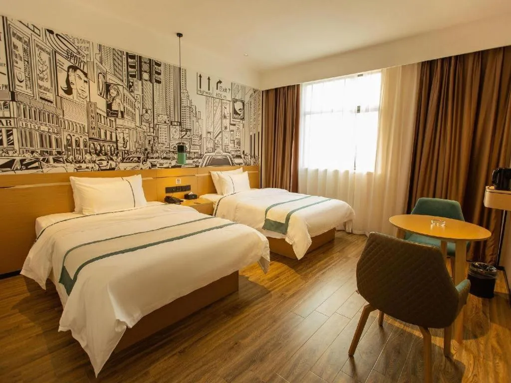 Bed in City Comfort Inn Shaoguan Biguiyuan Phoenix City Gold Village