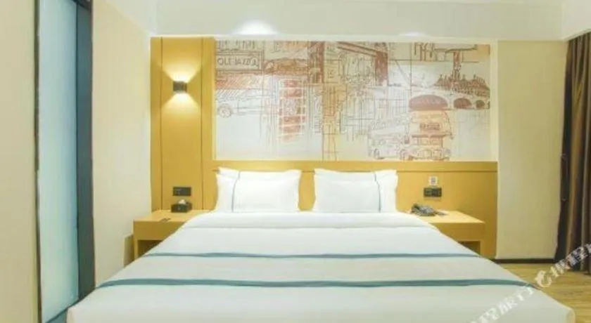 Bed in City Comfort Inn Wuzhou Sun Plaza Wanda