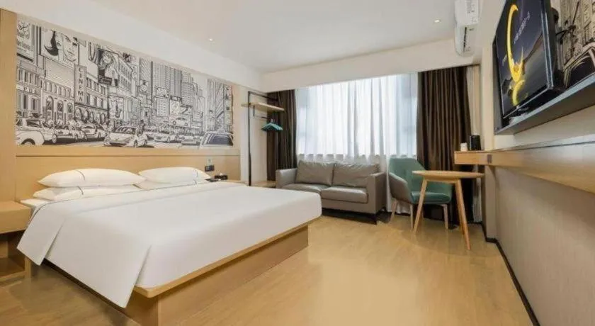Bed in City Comfort Inn Wuzhou Sun Plaza Wanda