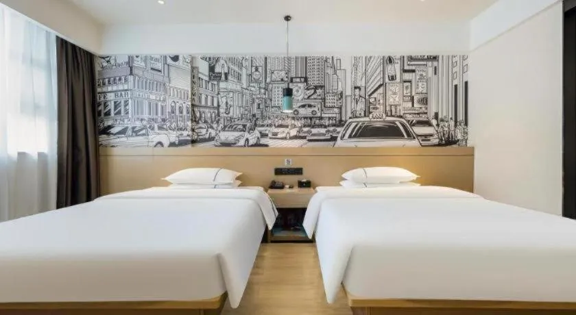 Bed in City Comfort Inn Wuzhou Sun Plaza Wanda