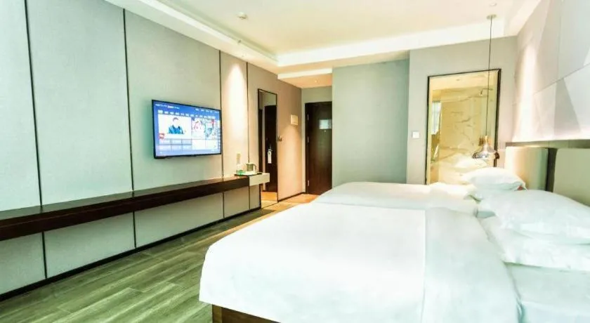 Bed in Borrman Hotel Yunfu Xinxing County Bus Station