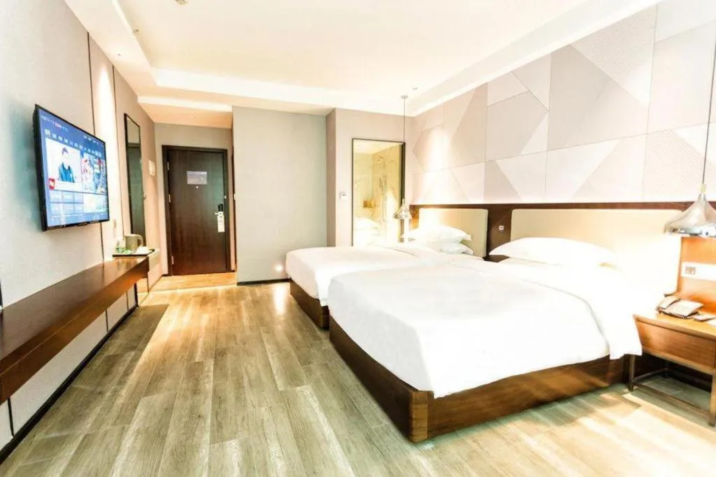 Bed in Borrman Hotel Yunfu Xinxing County Bus Station