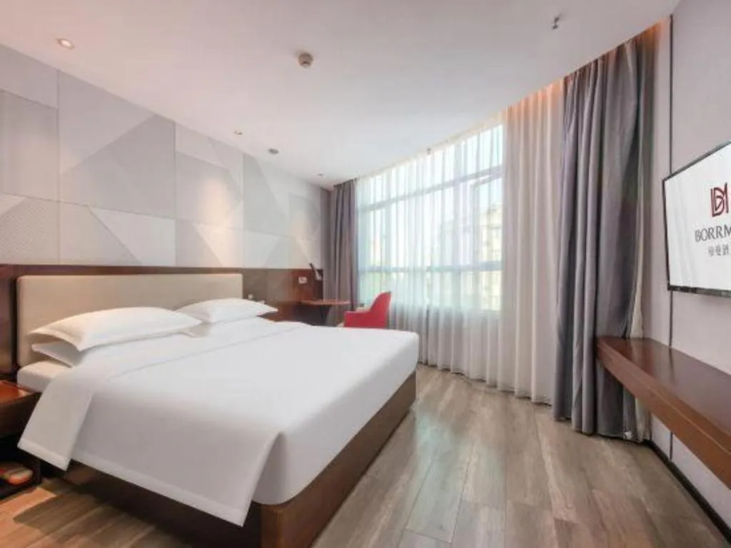 Bed in Borrman Hotel Yunfu Xinxing County Bus Station