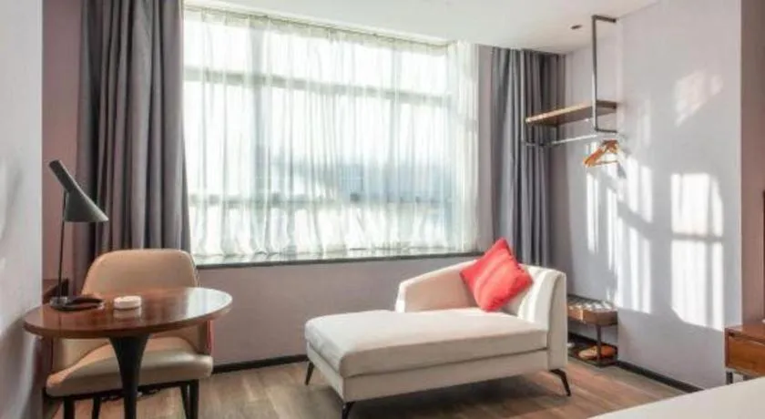 Bed in Borrman Hotel Yunfu Xinxing County Bus Station