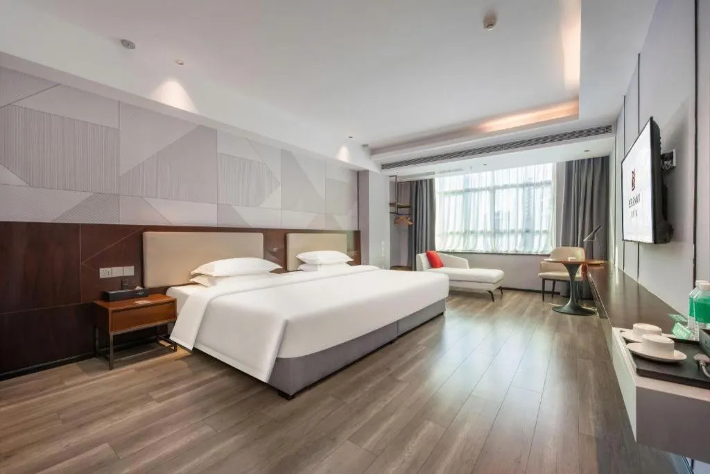 Bed in Borrman Hotel Yunfu Xinxing County Bus Station