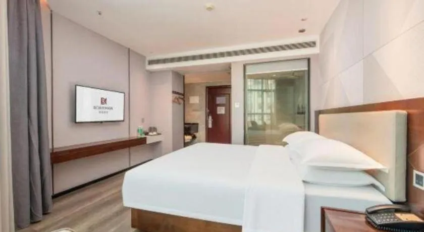 Bed in Borrman Hotel Yunfu Xinxing County Bus Station