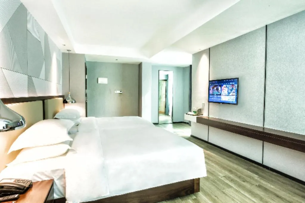 Bed in Borrman Hotel Yunfu Xinxing County Bus Station