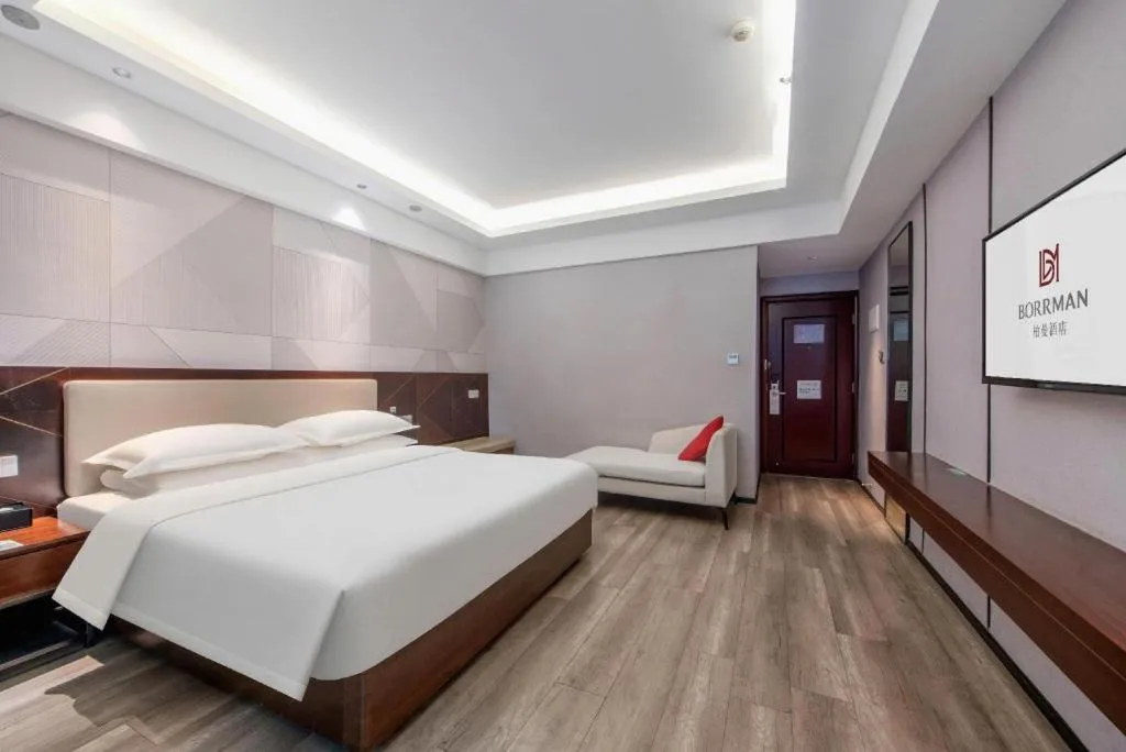 Bed in Borrman Hotel Yunfu Xinxing County Bus Station