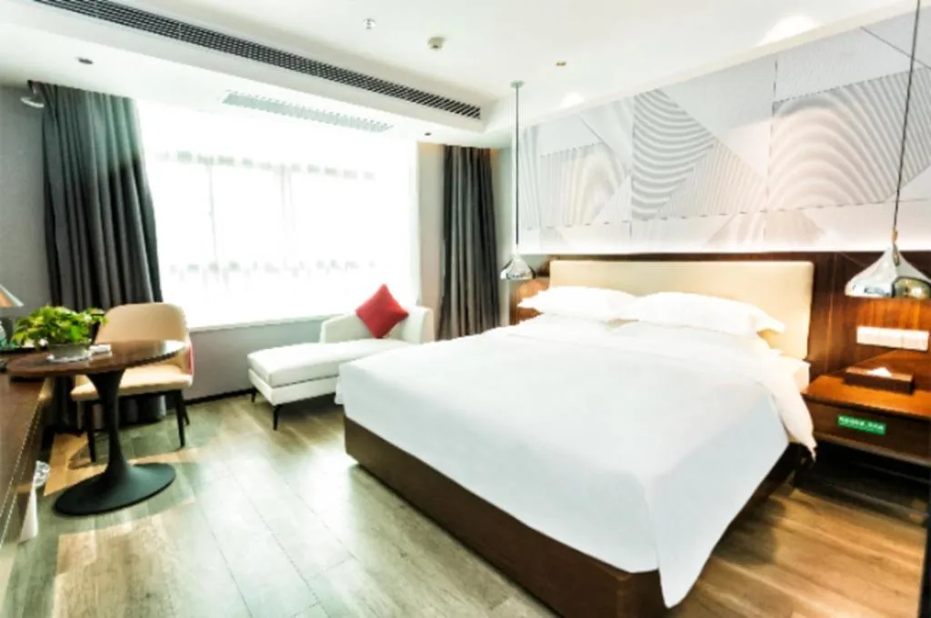 Bed in Borrman Hotel Yunfu Xinxing County Bus Station