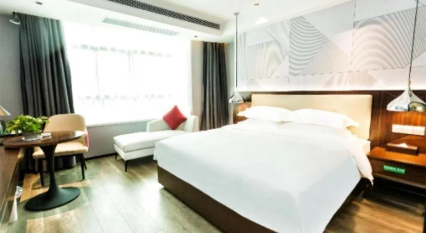 Bed in Borrman Hotel Yunfu Xinxing County Bus Station