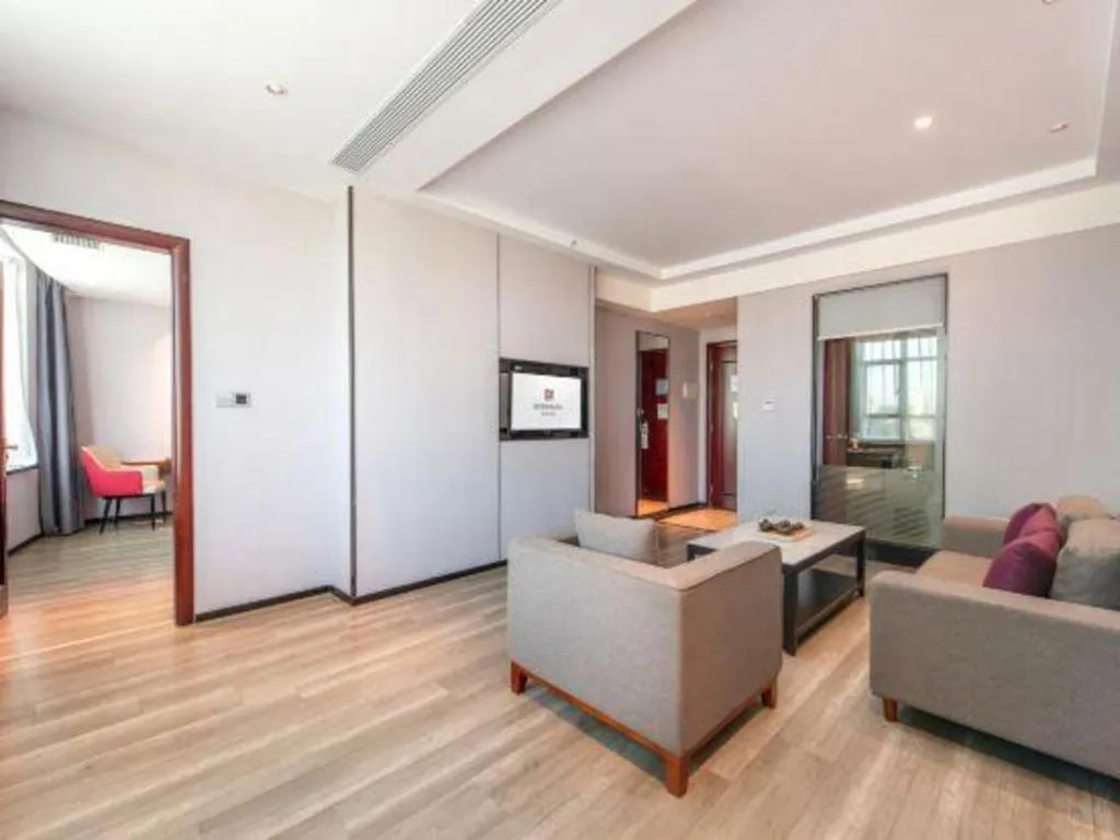 Bed in Borrman Hotel Yunfu Xinxing County Bus Station