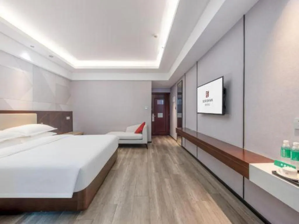 Bed in Borrman Hotel Yunfu Xinxing County Bus Station