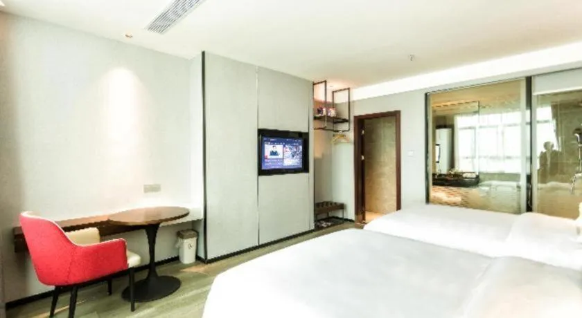 Bed in Borrman Hotel Yunfu Xinxing County Bus Station