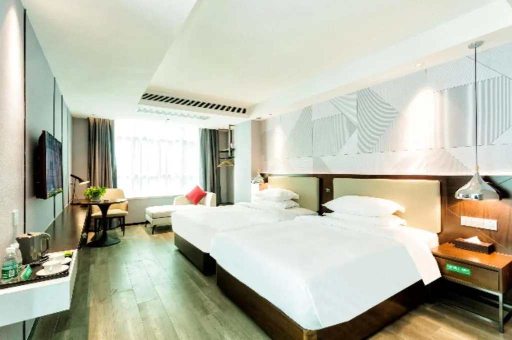 Bed in Borrman Hotel Yunfu Xinxing County Bus Station