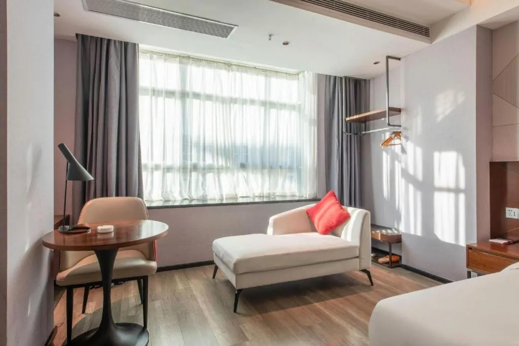 Bed in Borrman Hotel Yunfu Xinxing County Bus Station