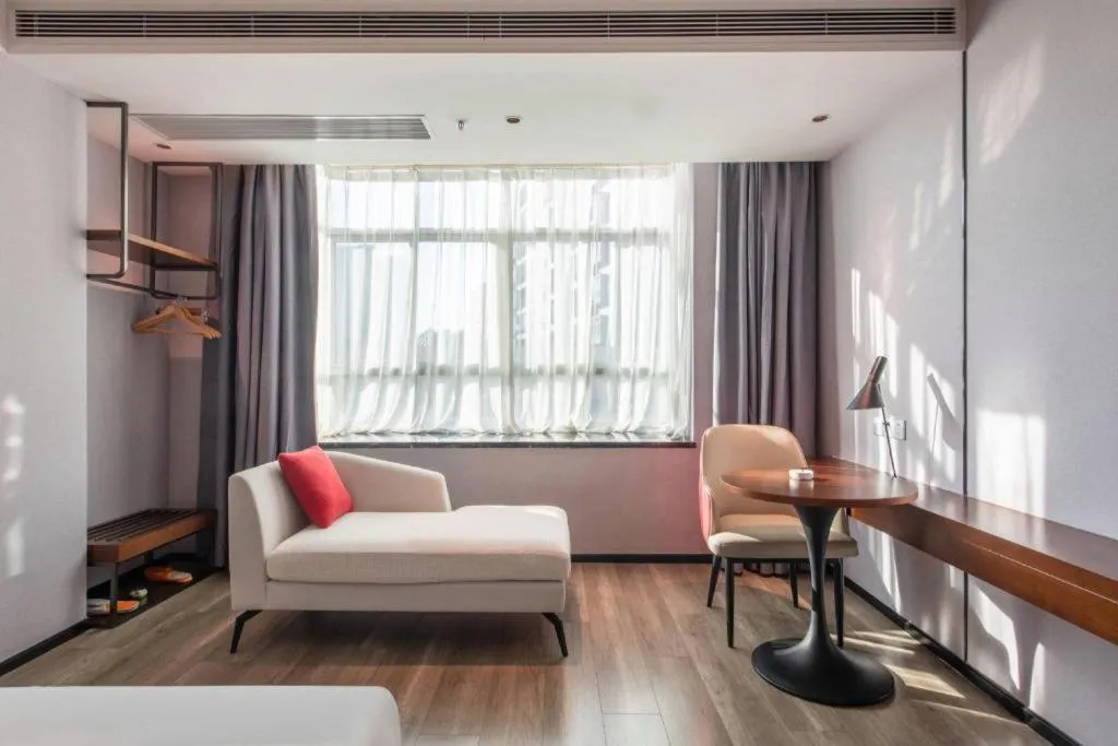 Bed in Borrman Hotel Yunfu Xinxing County Bus Station