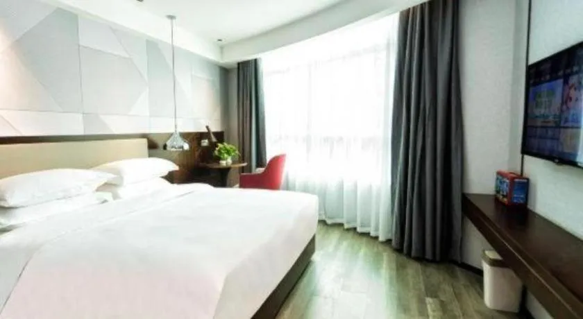 Bed in Borrman Hotel Yunfu Xinxing County Bus Station