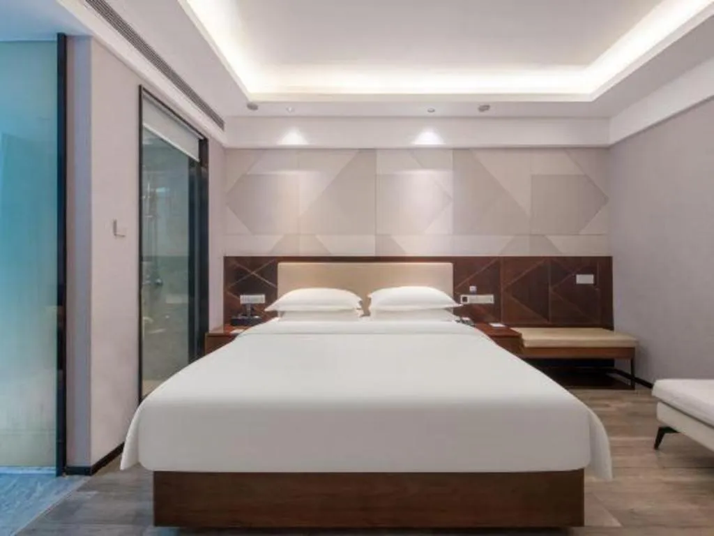 Bed in Borrman Hotel Yunfu Xinxing County Bus Station