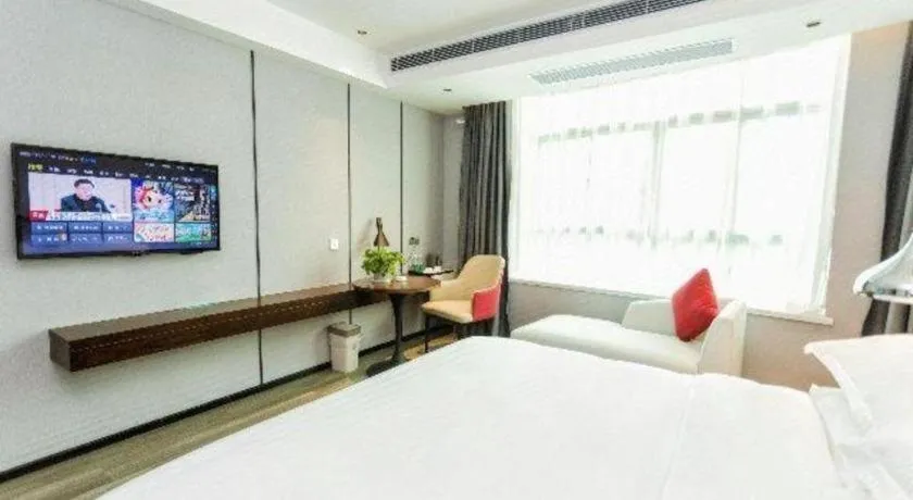 Bed in Borrman Hotel Yunfu Xinxing County Bus Station