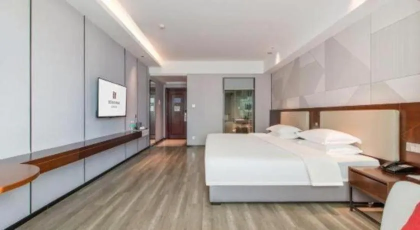 Bed in Borrman Hotel Yunfu Xinxing County Bus Station