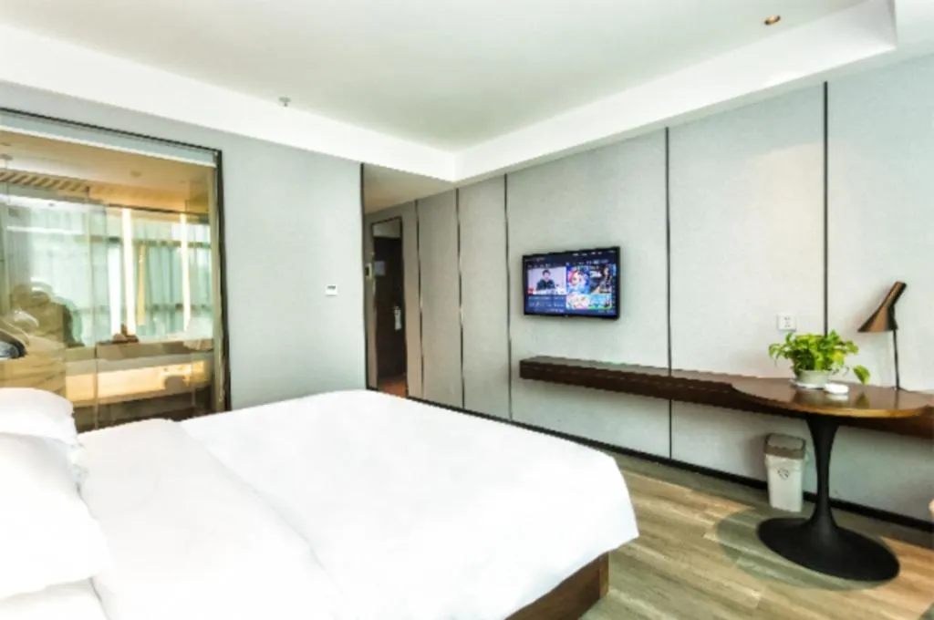 Bed in Borrman Hotel Yunfu Xinxing County Bus Station