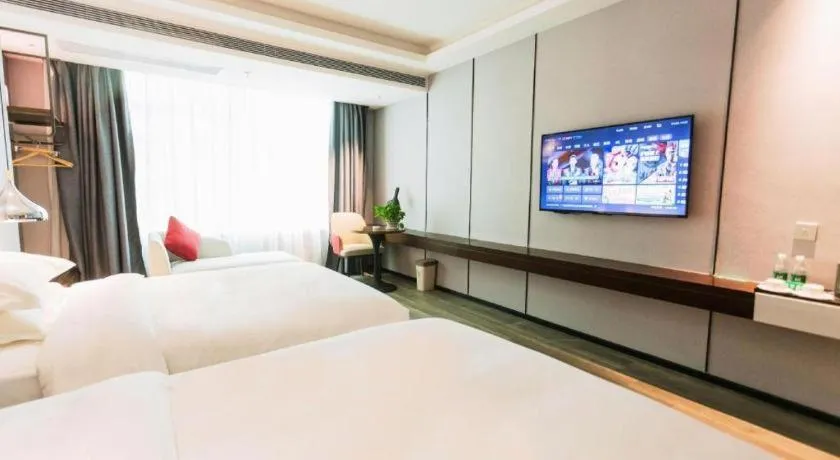 Bed in Borrman Hotel Yunfu Xinxing County Bus Station