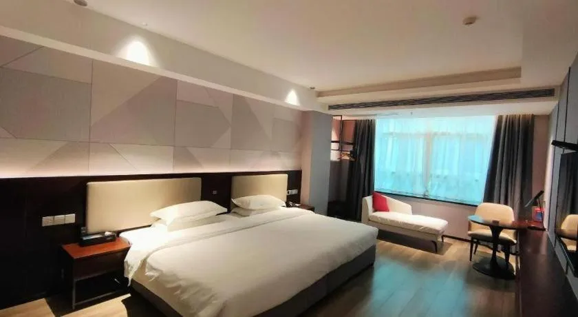 Bed in Borrman Hotel Yunfu Xinxing County Bus Station