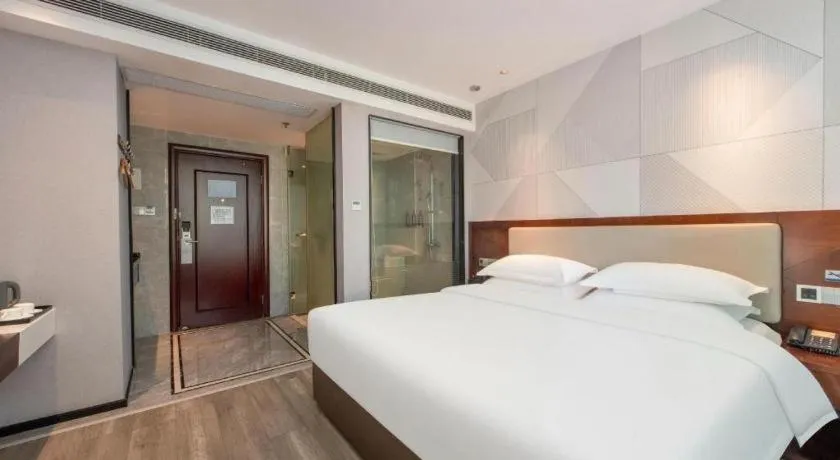 Bed in Borrman Hotel Yunfu Xinxing County Bus Station