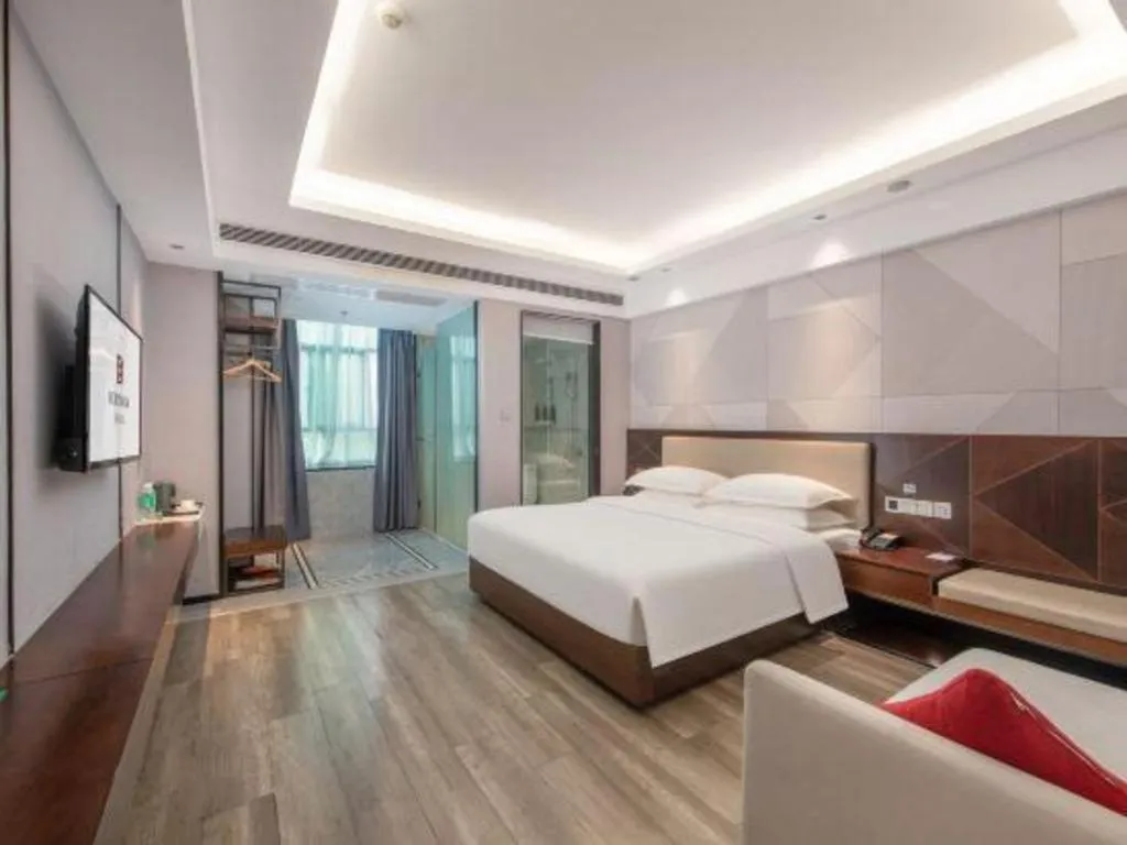 Bed in Borrman Hotel Yunfu Xinxing County Bus Station